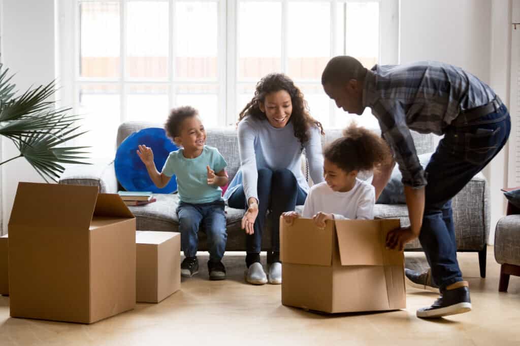 Family packing belongings for a move